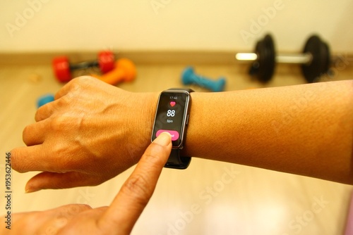 Hands using smart watch for do exercise. photo