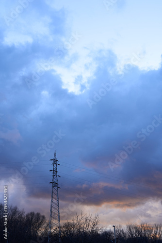 Evening Sky with Power Lines and Dramatic Clouds