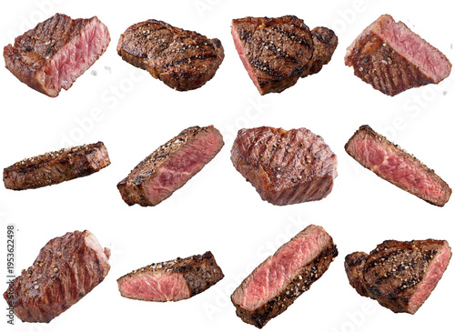 Collection of perfectly grilled medium-rare beef steaks seasoned with salt and pepper.