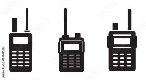 Three walkie talkie devices with antennas and keypads for communication  isolated on white background