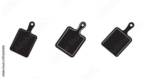 Three black cutting boards with handles for kitchen use  isolated on white background