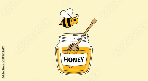 Honey jar with bee and dipper.