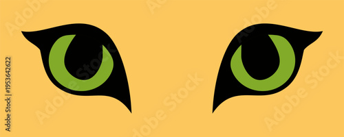 Green eyes of a puma, mountain lion, cougar close-up.