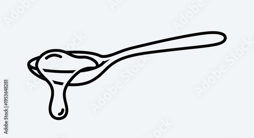 Spoon with honey or syrup dripping.