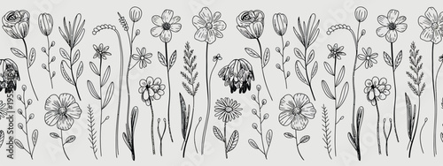 A black and white ink pattern of various flowers and plants ink floral pattern botanical