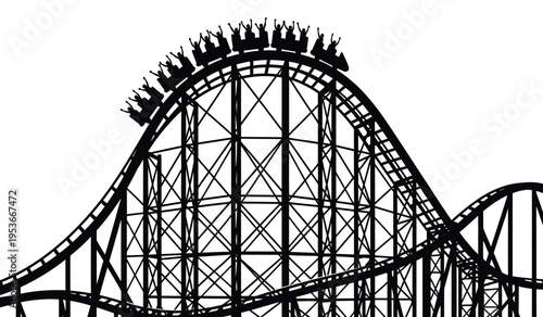Silhouette of a roller coaster with riders at the top of a hill