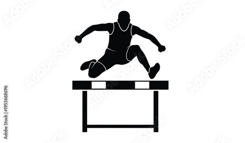 Athlete silhouette jumping over hurdle in track and field event