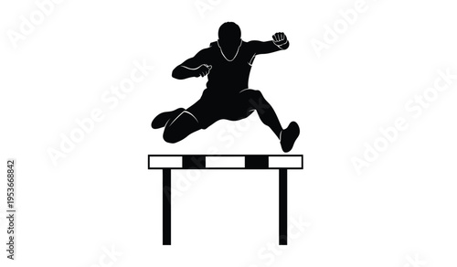Athlete silhouette jumping over hurdle in track and field event