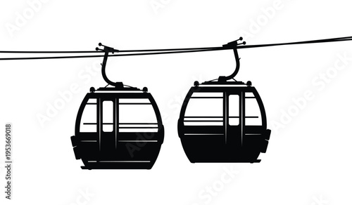 Silhouette of two cable cars or gondolas hanging from cables on a white background