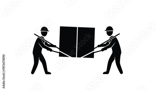 Two men in silhouette moving a large object with poles