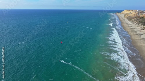 Wallpaper Mural Drone view of kitesurfers riding wind along Santa Marianita coastline near Manta, Ecuador. Torontodigital.ca