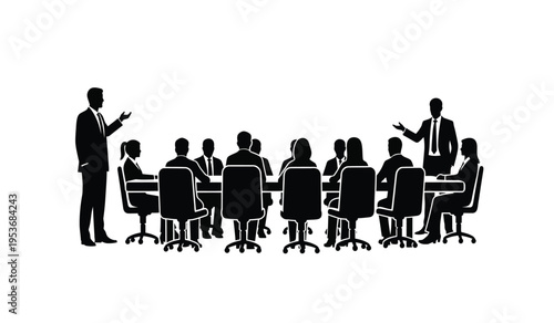 Silhouette of business meeting with people sitting around a table and two presenters