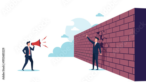 One businessman shouting through a megaphone while another professional breaks through a thick brick wall with his fist.