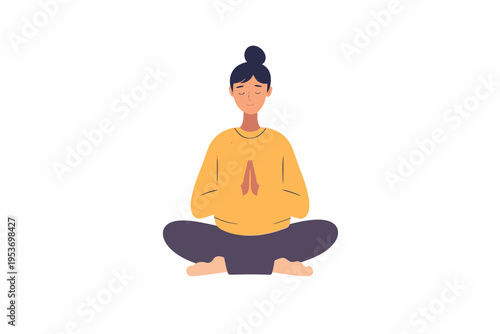 Female practicing meditation in seated pose with hands in namaste gesture