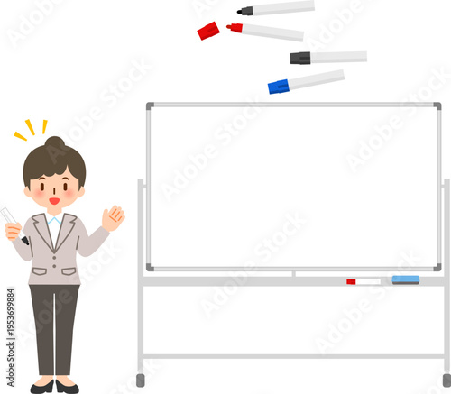 ホワイトボードの横に立つマーカーを持ったスーツの女性