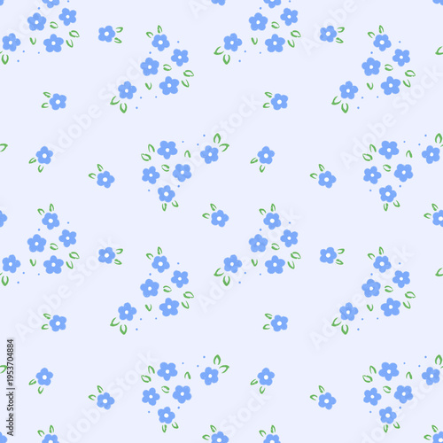 Seamless pattern with small blue flowers and green leaves on light blue background