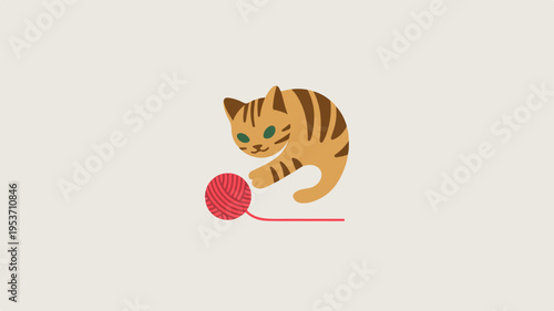 Playful orange tabby cat pounces on red ball of yarn on beige background curious and adorable feline fun