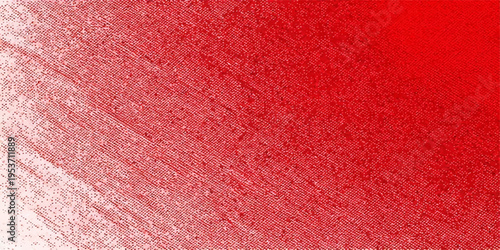 A vintage red fabric and rough paper texture design creates a grunge textile background with a pink patterned cloth surface for a blank wallpaper backdrop