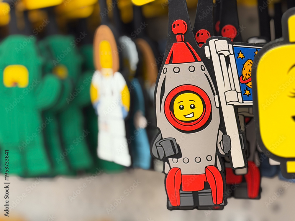 Fototapeta premium Smiling lego astronaut rocket keychain