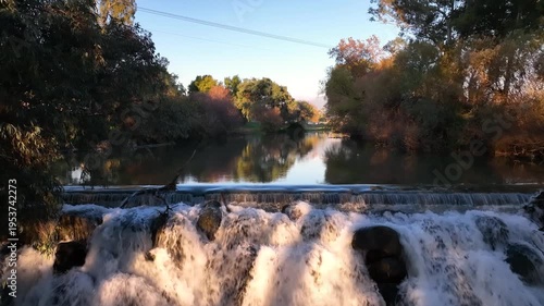 Aerial View of Jordan River Cascade Scenic Waterfall and River Flow at Kfar Blum, Northern Israel