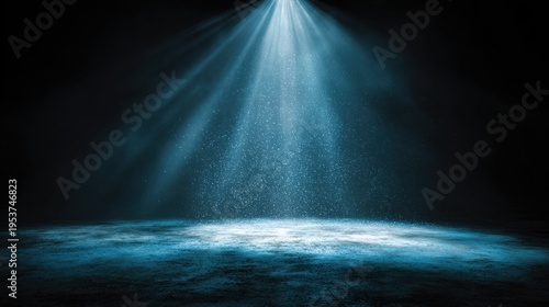 Dramatic Blue Spotlight Effect with Rays of Light Creating a Mystical Atmosphere in a Dark Space, Perfect for Backgrounds or Creative Design Projects