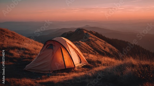 Serene Sunset Camping Scene in the Mountains with a Vibrant Orange Tent Surrounded by Breathtaking Natural Landscape and Peaceful Tranquility