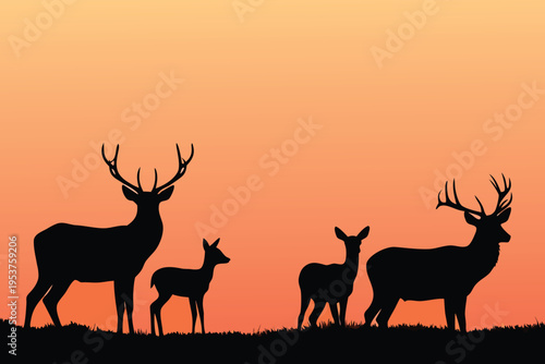 Silhouette of deer family against a vibrant orange sunset sky