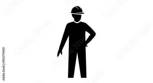 Silhouette of a construction worker standing.