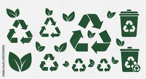 Recycling symbols with green leaves.