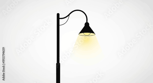 Black street lamp post with light.