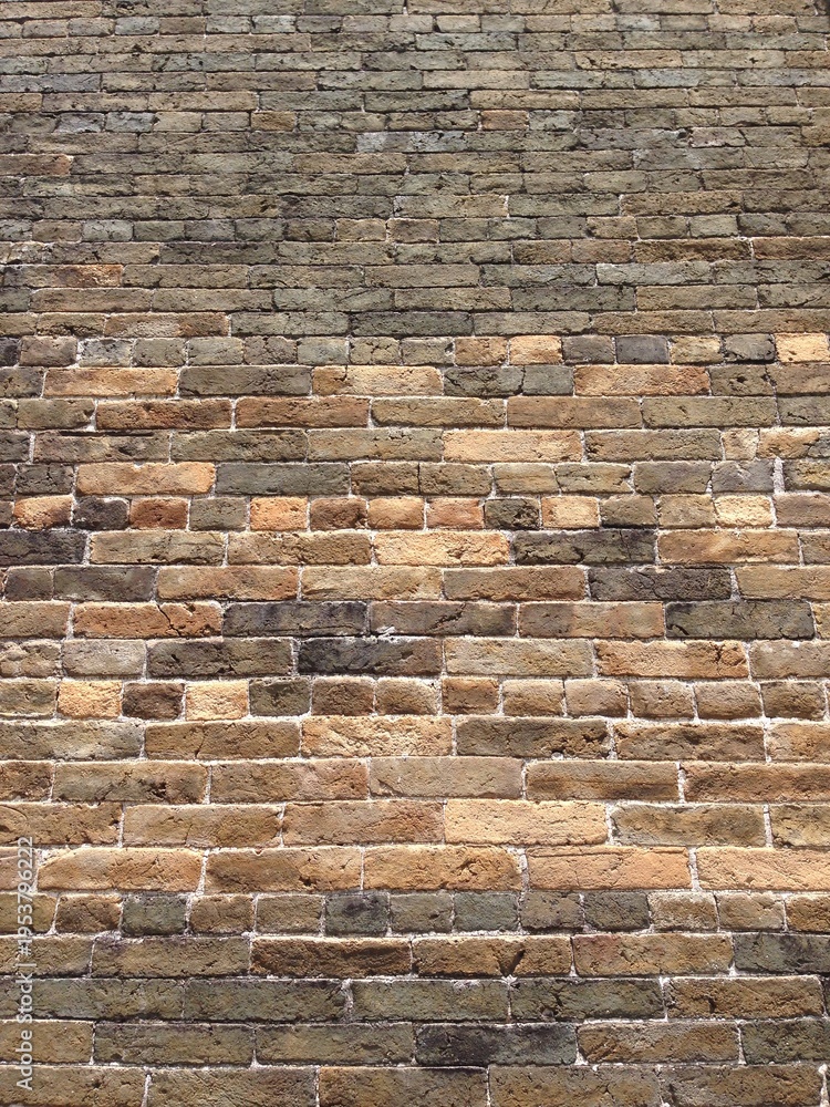 Naklejka premium aged brick wall with weathered texture