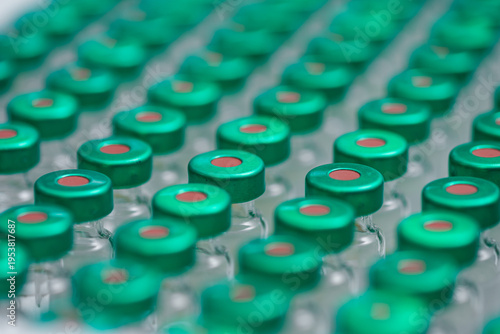 Wallpaper Mural Closeup Rows Of Vaccine Vials With Green Caps, Sterile Tray Filling, Pharmacy Technician Preparing Doses, Cool Torontodigital.ca