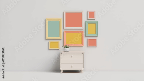 Minimalist wall gallery with colorful frames above a cream dresser with a small potted plant with chest of drawers