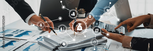 Cuadro en lienzo A detailed view of hands working together on financial documents, portraying strategic planning, data analysis, and cost management in an office environment