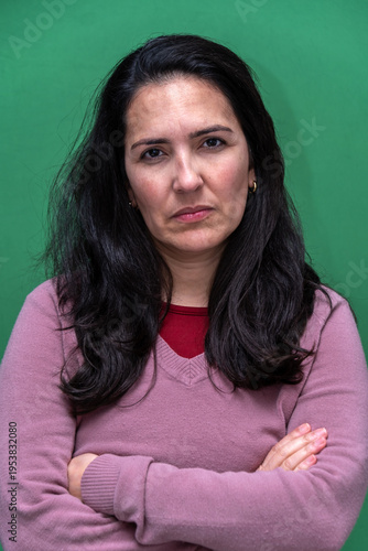 Photography Woman showing sadness and displeasure with crossed arms