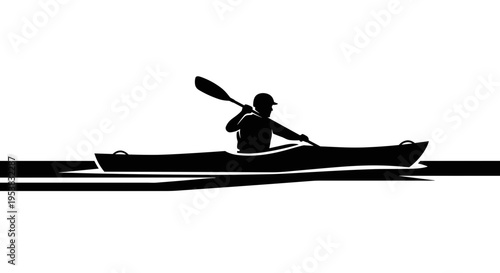 Silhouette of man in kayak.