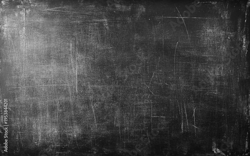 Chalk rubbed out on blackboard background. A black or dark gray chalkboard surface with a slightly rough texture.  Vector illustration.