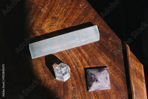 A set of natural minerals for treatment. Healing crystal stones on the background. Quartz and amethyst. Alternative medicine, esoteric