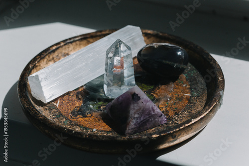 A set of natural minerals for treatment. Healing crystal stones on the background. Quartz and amethyst. Alternative medicine, esoteric