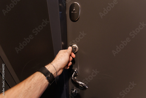 Reflected light highlights texture as door unlocks smoothly