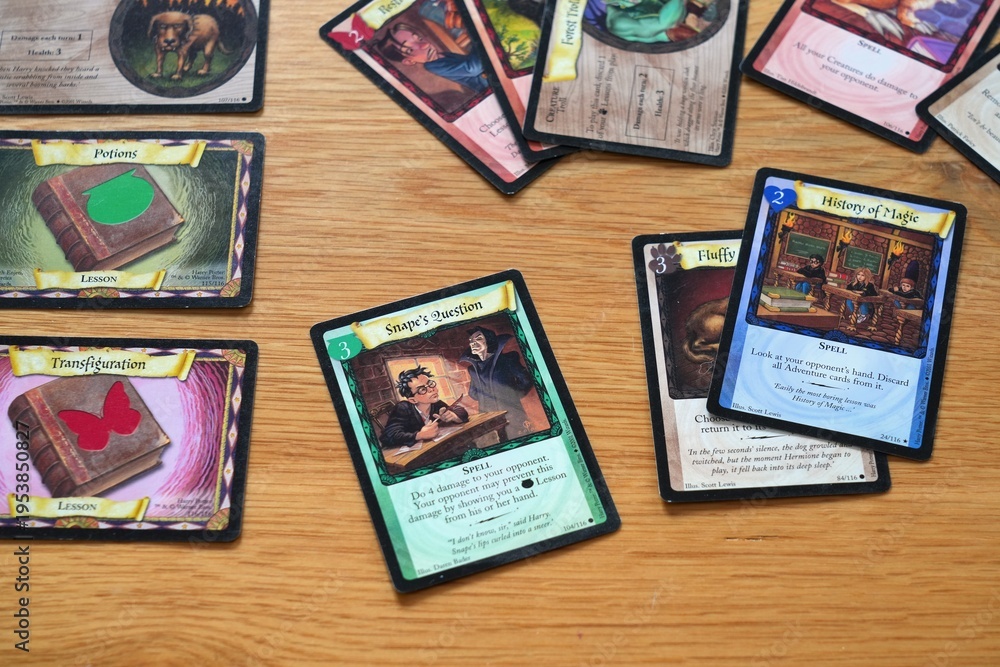 Fototapeta premium WARSAW, POLAND - MARCH 19, 2026: Cards of Harry Potter Trading Card Game, a collectible card game based in the world of Harry Potter novels. It was published by Wizards of the Coast.