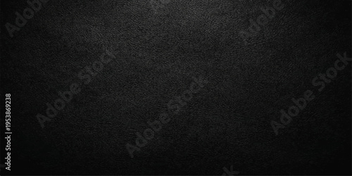 A dark and textured black leather fabric material background with a rough macro skin pattern and blank textile surface backdrop