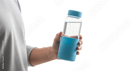 Person holding reusable water bottle with blue silicone sleeve