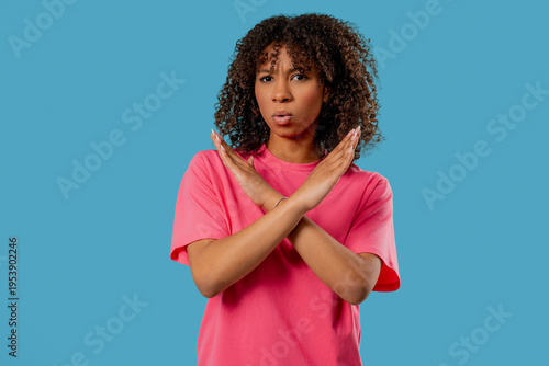 Uninterested Serious Teenage Girl Disapproving No Sign. Denying, Rejecting, Enough, stop crossing hands sign