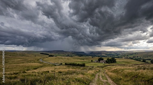 Developing storm clouds bringing heavy rain over rural landscape