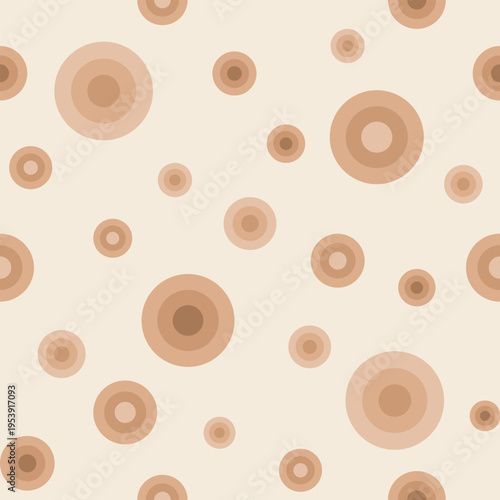Seamless tossed concentric circle pattern in neutral beige and warm caramel tones

