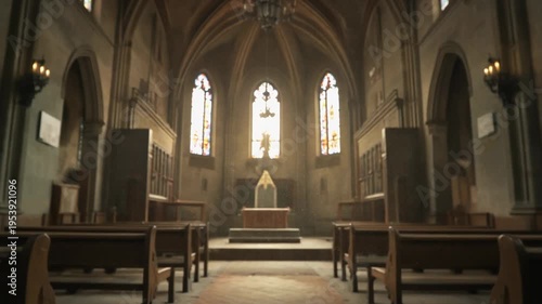 Interior of a historic church with rows of wooden pews facing the altar through arched windows.