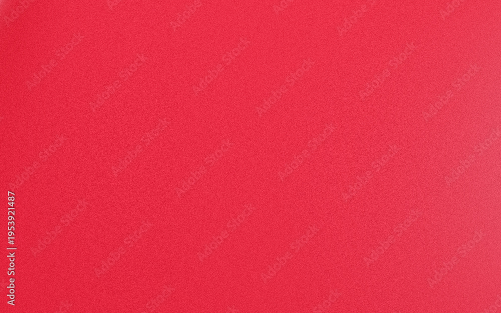 Fototapeta premium Close-up view of a textured red fabric with subtle grainy appearance