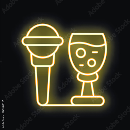 Yellow neon sign representing a karaoke bar, with a microphone and a cocktail glass