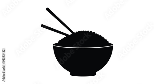 A black bowl of rice with chopsticks a striking silhouette